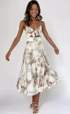 Mandotos floral boho chic midi dress with colorful floral pattern and flowing fabric, perfect for summer or casual wear.