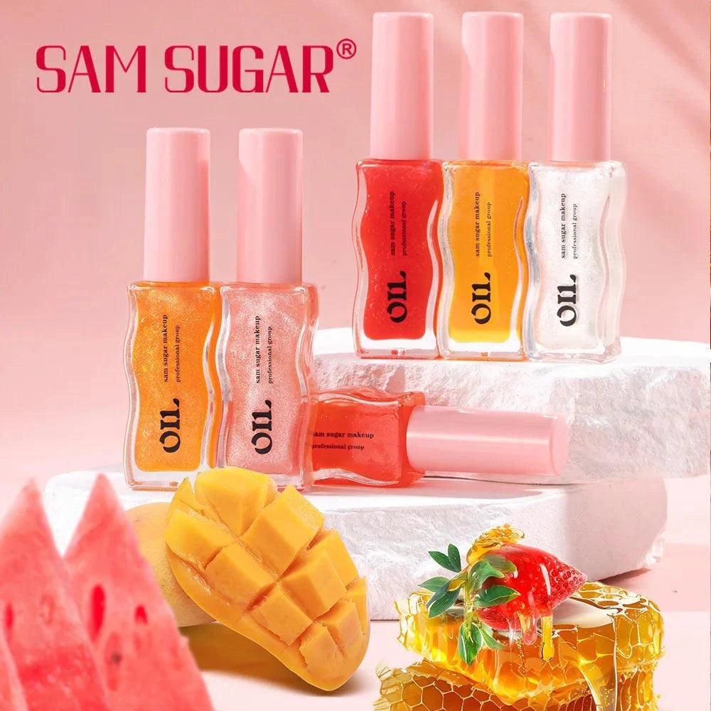 Mandotos Fruit Honey Essence Lip Oil with strawberry tint, waterproof moisturizing lip gloss in 8ml container.