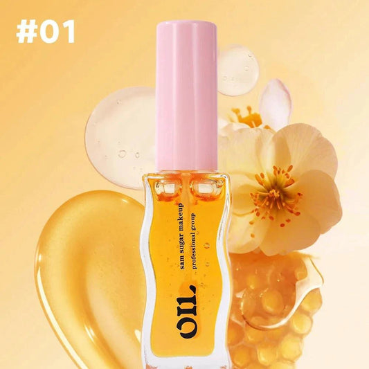 Mandotos Fruit Honey Essence Lip Oil with strawberry tint, waterproof and moisturizing, in 8ml tube with glossy finish.