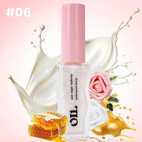Mandotos Strawberry Tinted Lip Oil with honey essence, waterproof and moisturizing, in 8ml tube, glossy and natural lip shine.