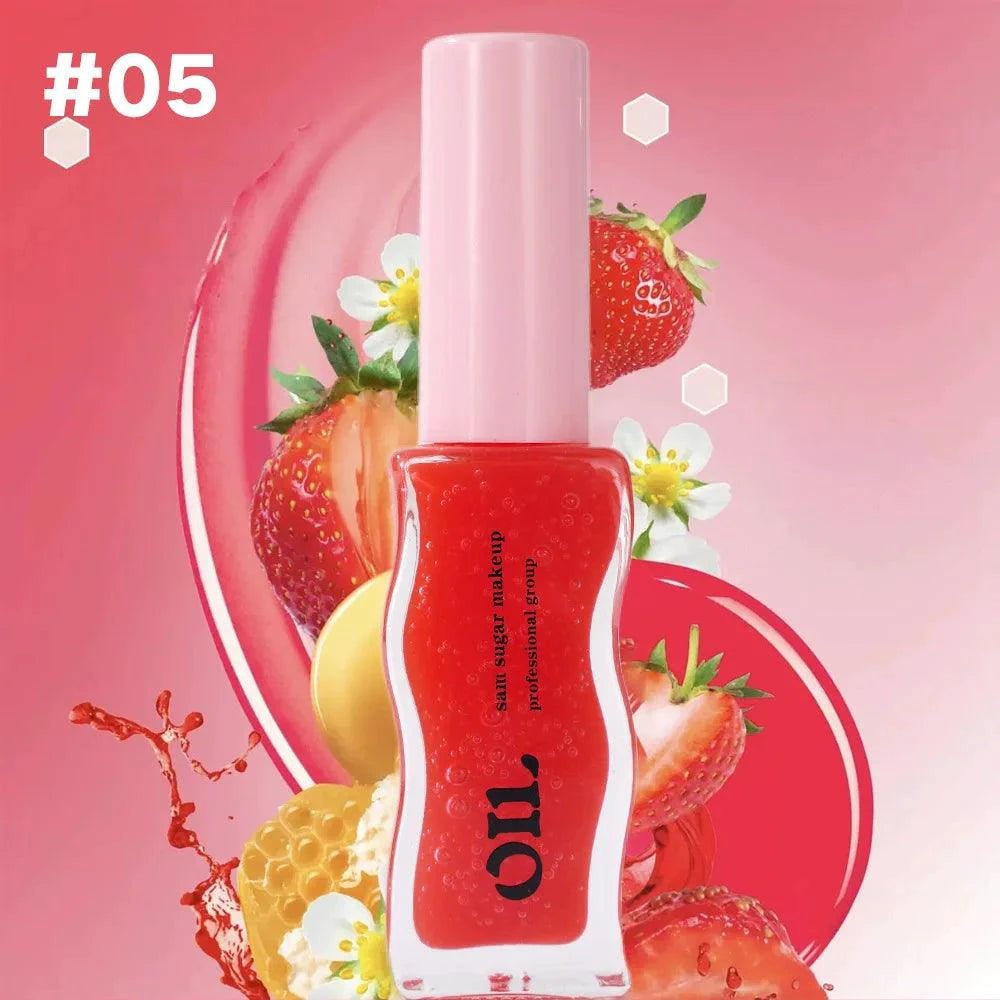 Mandotos Fruit Honey Essence Lip Oil with strawberry tint, waterproof and moisturizing, in an 8ML applicator tube.