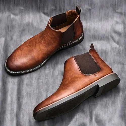Mandotos Gentleman's Choice leather boots featuring classic design, brown leather, and sturdy sole for stylish men's footwear.