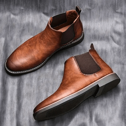 Mandotos Gentleman's Choice leather boots featuring sleek design, sturdy soles, and polished finish for stylish men's footwear.