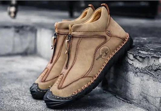 Mandotos Gentleman's Leather Loafers, black leather slip-on shoes with sleek design and stitching detail.