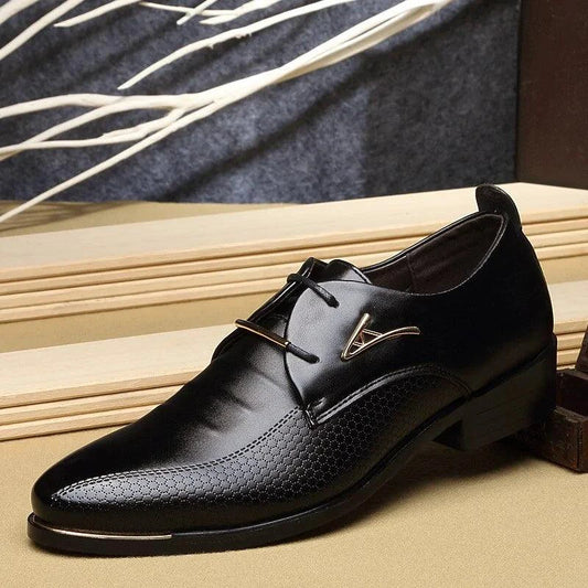Mandotos Gentlemen's refined leather loafers with classic slip-on design and sleek brown finish, suitable for formal or casual wear.