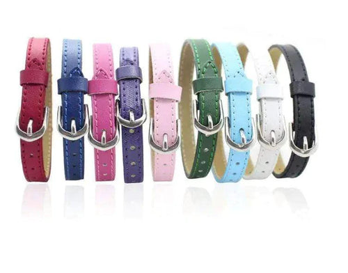 Genuine leather slider bracelet from MANDOTOS with adjustable strap and minimalist design, showcasing smooth leather and metal accents.