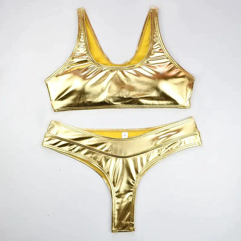 Metallic gold and silver swimsuit by MANDOTOS, featuring a shiny, form-fitting design with a stylish swimwear look.