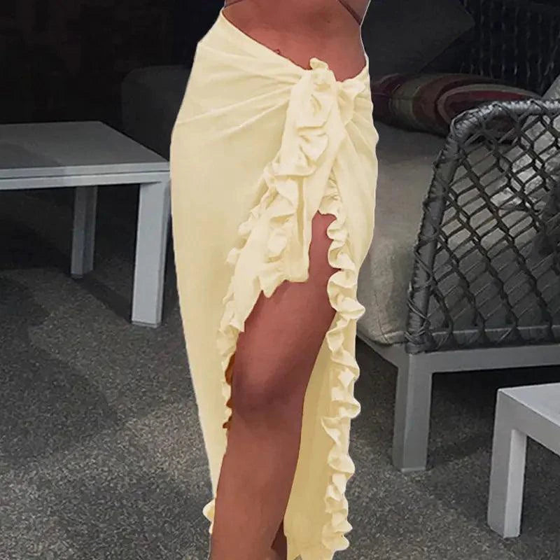 Mandotos GlamourWave chiffon beach wrap draped elegantly, perfect for sunny days and effortless seaside style.