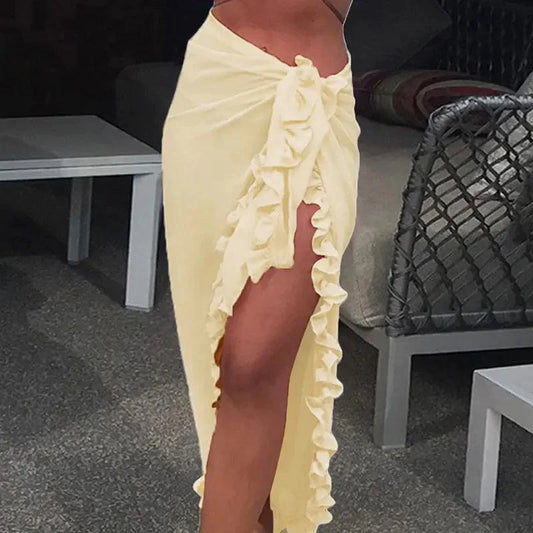 Mandotos GlamourWave chiffon beach wrap draped elegantly, perfect for sunny days and effortless seaside style.