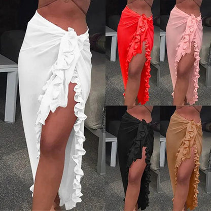 Mandotos GlamourWave chiffon beach wrap draped over a model, showcasing lightweight, elegant fabric for sunny beach days.