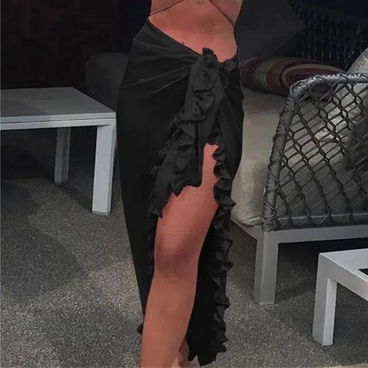 Mandotos GlamourWave chiffon beach wrap draped over a model, showcasing lightweight, elegant fabric for sunny day beachwear.