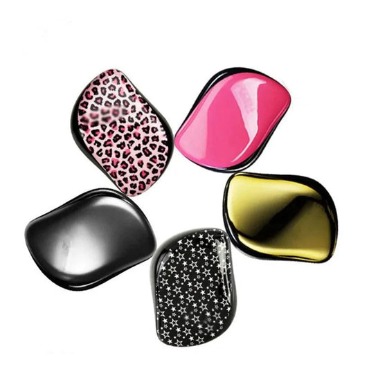 Mandotos GlamWave Luxe hair styling brush with detangling bristles for smooth, shiny hair and effortless styling.