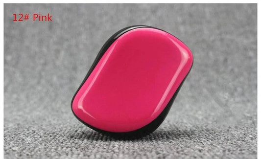 Mandotos GlamWave Luxe hair styling brush with detangling bristles for smooth, shiny hair and effortless styling.
