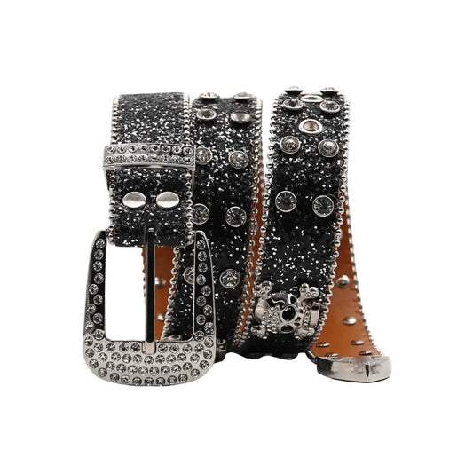 Glitzy skull fashion belt by MANDOTOS with shiny metal skull buckle and black leather strap, stylish accessory for edgy outfits.