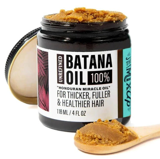 Mandotos Glow Restore Hair Mask in a jar, showing a creamy, nourishing hair treatment with natural ingredients for revitalized hair.