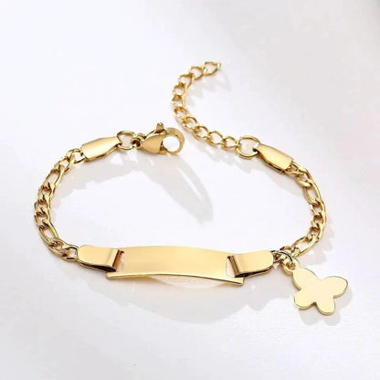 Gold butterfly charm bracelet for kids by MANDOTOS, featuring delicate butterfly charms on a sleek gold-tone chain.