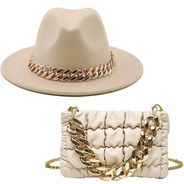 Luxury gold chain fedora hat by MANDOTOS featuring a stylish gold chain detail on the classic fedora design.