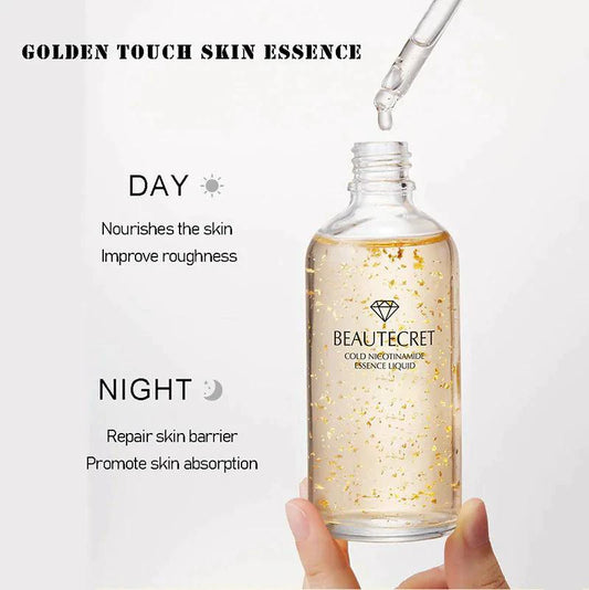 Mandotos Gold Essence Hyaluronic Serum bottle with dropper, showing luxurious gold packaging and clear serum inside.