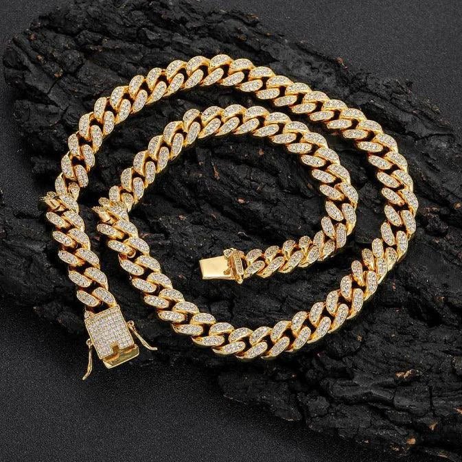 Mandotos Gold Shine Iced Cuban Chain showcasing a luxurious, iced-out design with bright gold finish and detailed link craftsmanship.