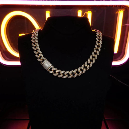 Gold Shine Iced Cuban Chain by MANDOTOS featuring sparkling iced accents and a bold, luxe style upgrade.