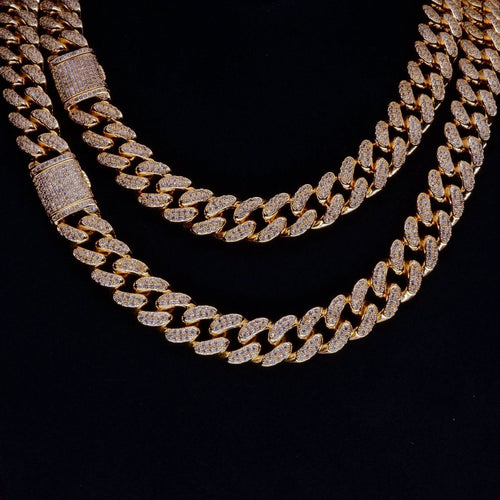 Mandotos Gold Shine Iced Cuban Chain featuring a luxe style upgrade with sparkling iced details and a bold Cuban link design.