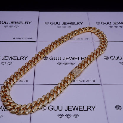 Mandotos Gold Shine Iced Cuban Chain featuring a luxe style upgrade with sparkling iced detailing.