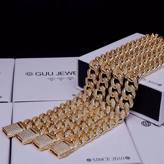 Mandotos Gold Shine Iced Cuban Chain with luxe style upgrade, featuring a thick gold-tone chain with sparkling iced accents.