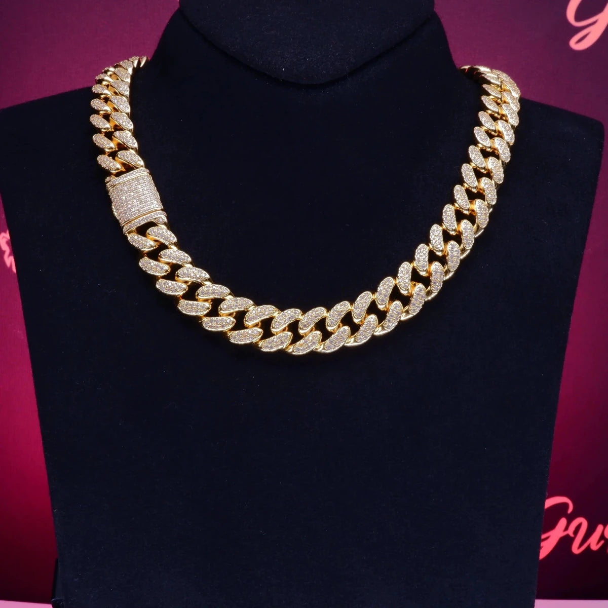 Mandotos Gold Shine Iced Cuban Chain featuring a luxe style upgrade with sparkling iced detailing and a bold, chunky design.
