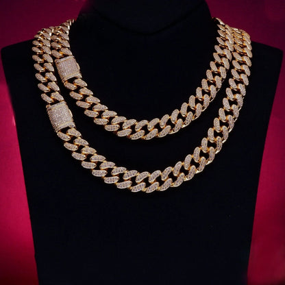 Mandotos Gold Shine Iced Cuban Chain with sparkling iced accents and a luxe style upgrade, showcasing bold jewelry craftsmanship.