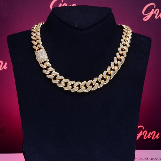 Mandotos Gold Shine Iced Cuban Chain featuring a luxe style upgrade with thick gold links and sparkling iced detailing.