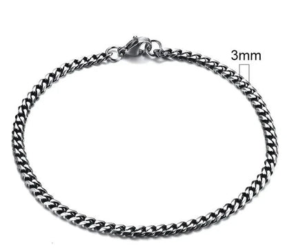 Gold-tone stainless steel Cuban bracelet from MANDOTOS, 3-11mm width, featuring a sleek, polished chain design.