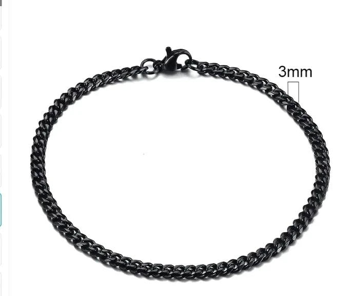 Gold-tone stainless steel Cuban bracelet with 3-11mm links, crafted by MANDOTOS, displayed in a close-up image.