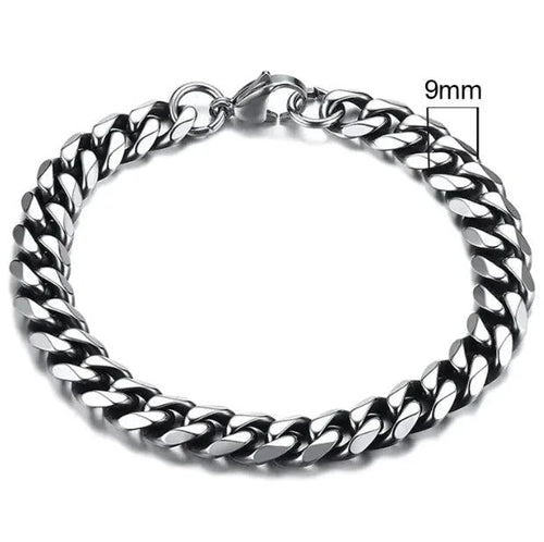 Gold-tone stainless steel Cuban bracelet from MANDOTOS, 3-11mm width, featuring polished, interlocking links on a sleek design.