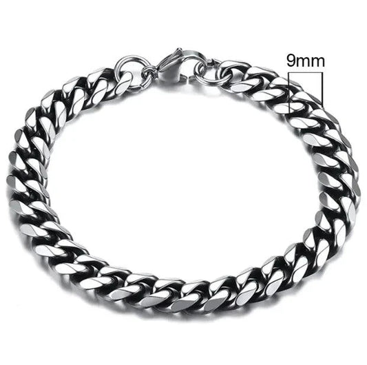 Gold-tone stainless steel Cuban bracelet from MANDOTOS, 3-11mm width, featuring polished, interlocking links on a sleek design.