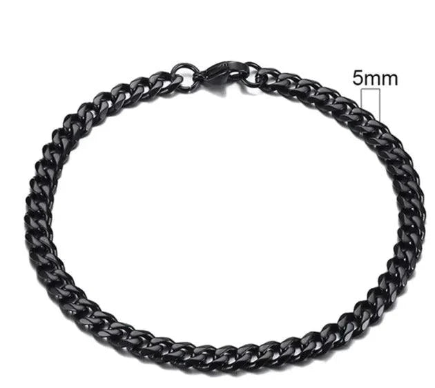 Gold-tone stainless steel Cuban bracelet by MANDOTOS, 3-11mm wide, showcasing a sleek, polished chain design.