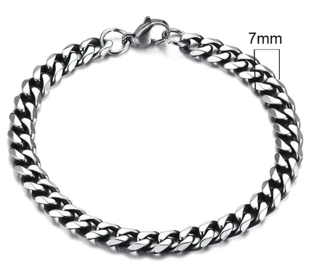 Gold-tone stainless steel Cuban bracelet with 3-11mm links from MANDOTOS, showcasing a sleek and polished design.