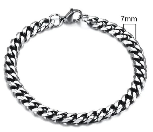 Gold-tone stainless steel Cuban bracelet with 3-11mm links from MANDOTOS, showcasing a sleek and polished design.