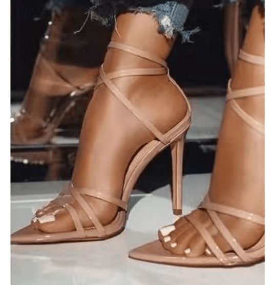 Golden strappy stiletto pumps by MANDOTOS featuring sleek design and high heels, suitable for elegant dressy occasions.