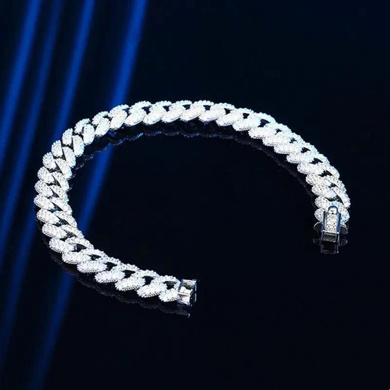 18k gold Cuban link bracelet by MANDOTOS, showcasing a shiny, sturdy gold chain with a secure clasp.