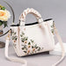 Mandotos women's tote bag with shoulder strap, stylish handbag for shopping and casual use, in a versatile design.