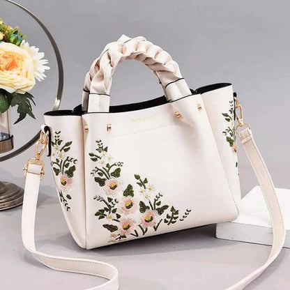 Mandotos women's tote bag with shoulder strap, stylish handbag for shopping and casual use, in a versatile design.