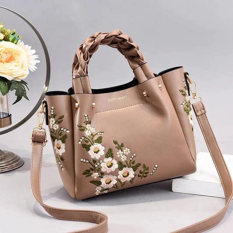 Mandotos tote bag for women, shoulder style, spacious shopping handbag with stylish design and comfortable handles.