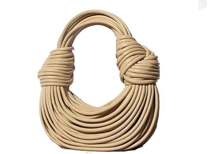 Mandotos gold luxury designer women's handbag featuring handwoven noodle design, rope knots, and silver evening clutch style.