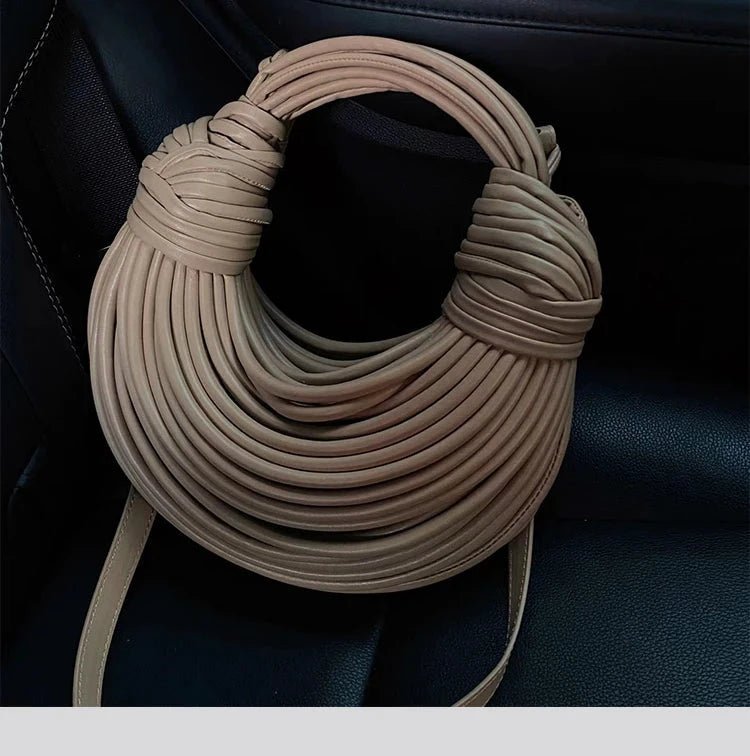Mandotos women's 2025 gold luxury designer handbag with handwoven noodle design, rope knotted pull, and silver evening clutch style.