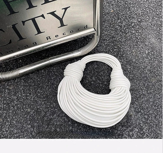 Mandotos women's luxury gold woven handbag with rope knot detail, hobo silver evening clutch, stylish designer bag for 2025.