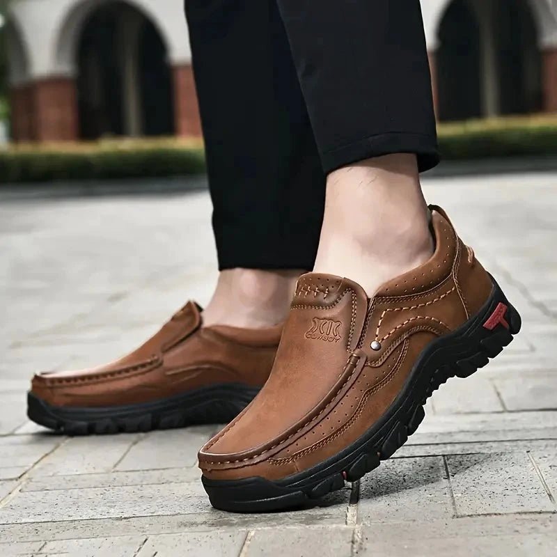 Mandotos handmade leather men's casual slip-on loafers with a sleek design, suitable for outdoor walking and non-slip comfort.
