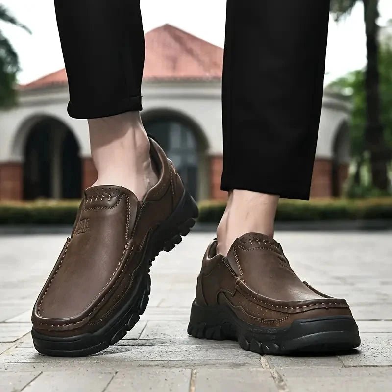 Mandotos handmade leather men's casual slip-on loafers with a sleek design, perfect for outdoor walking and non-slip comfort.