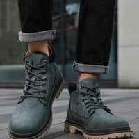 Mandotos handmade men's ankle leather boots for winter and outdoor hiking, featuring high-top design and anti-slip soles.