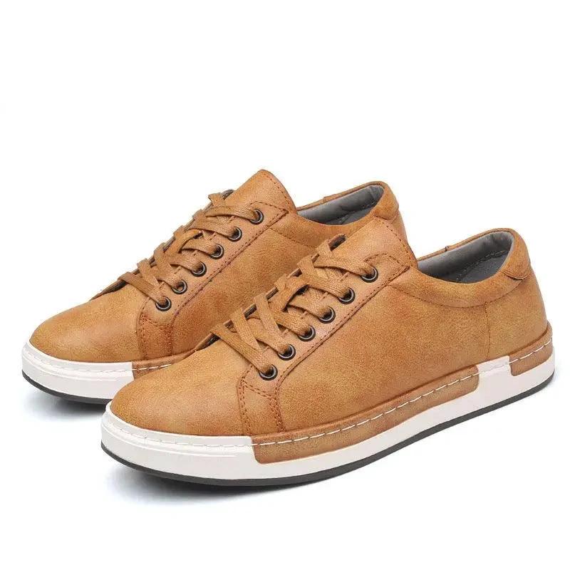 Handmade men's casual trainer shoes by MANDOTOS with closed toe design and stylish leather finish.