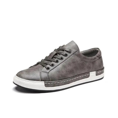 Handmade men's casual trainer shoes by MANDOTOS with closed toe design, crafted for comfort and style.